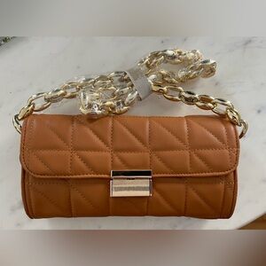 Tan clutch handbag